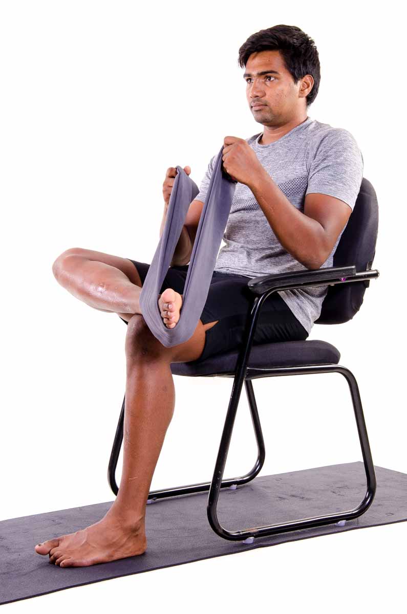 Sitting Inversion Stretch With Towel - Vissco Healthcare Private Limited.